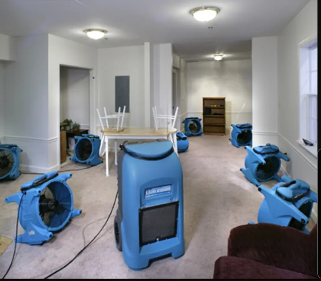 Air movers and dehumidifier setup for Water Damage Restoration in Asheville